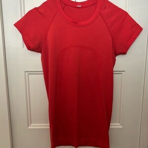 Red swiftly tee